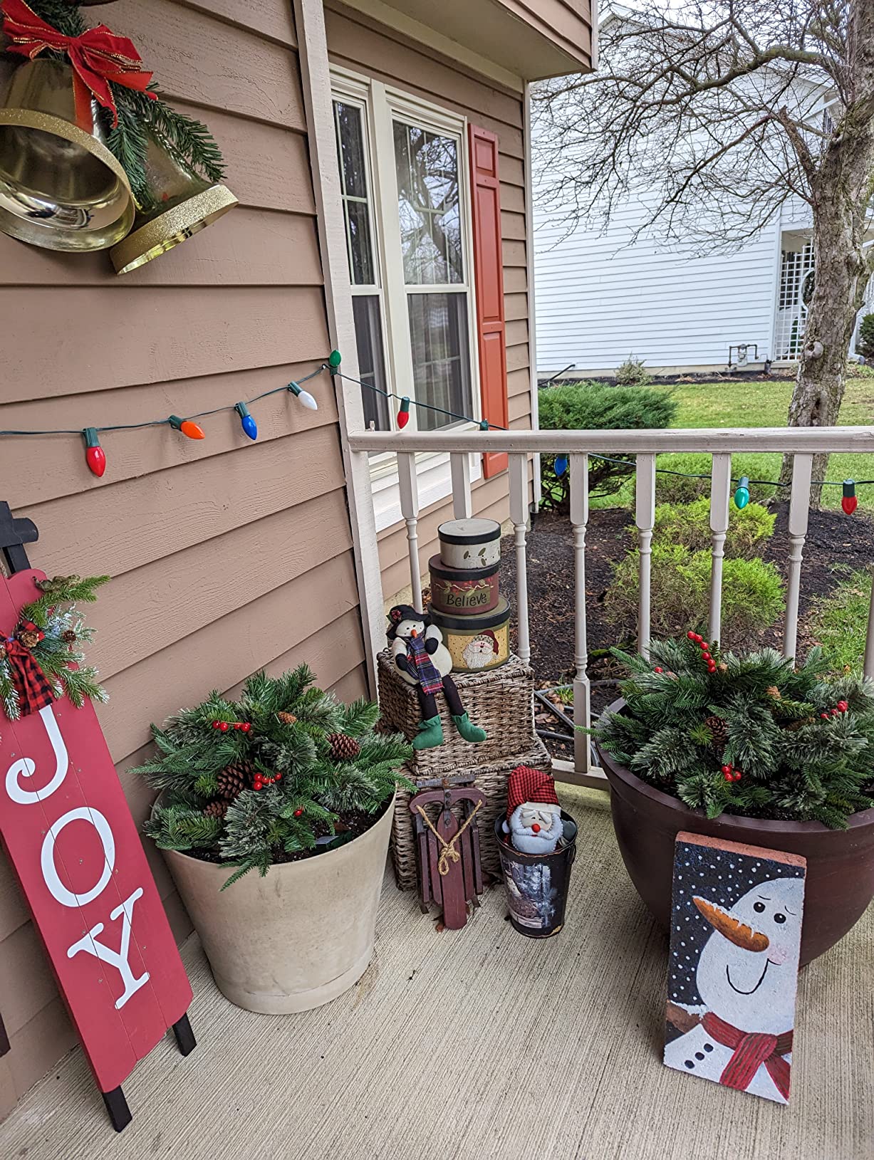 Pre-lit Artificial Christmas Tree Urn Filler ~ Weatherproof sparkle for entryways and patios.