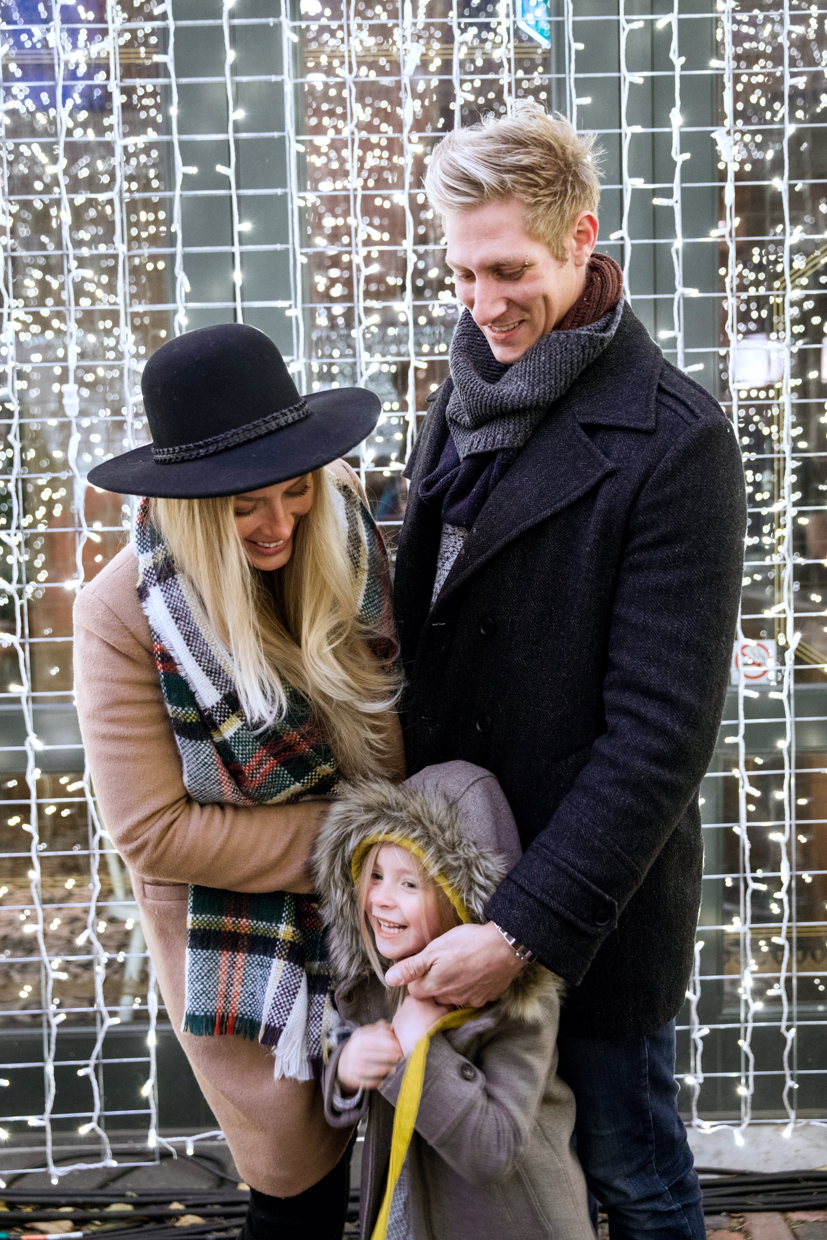 files/family-laughing-with-holiday-lights.jpg
